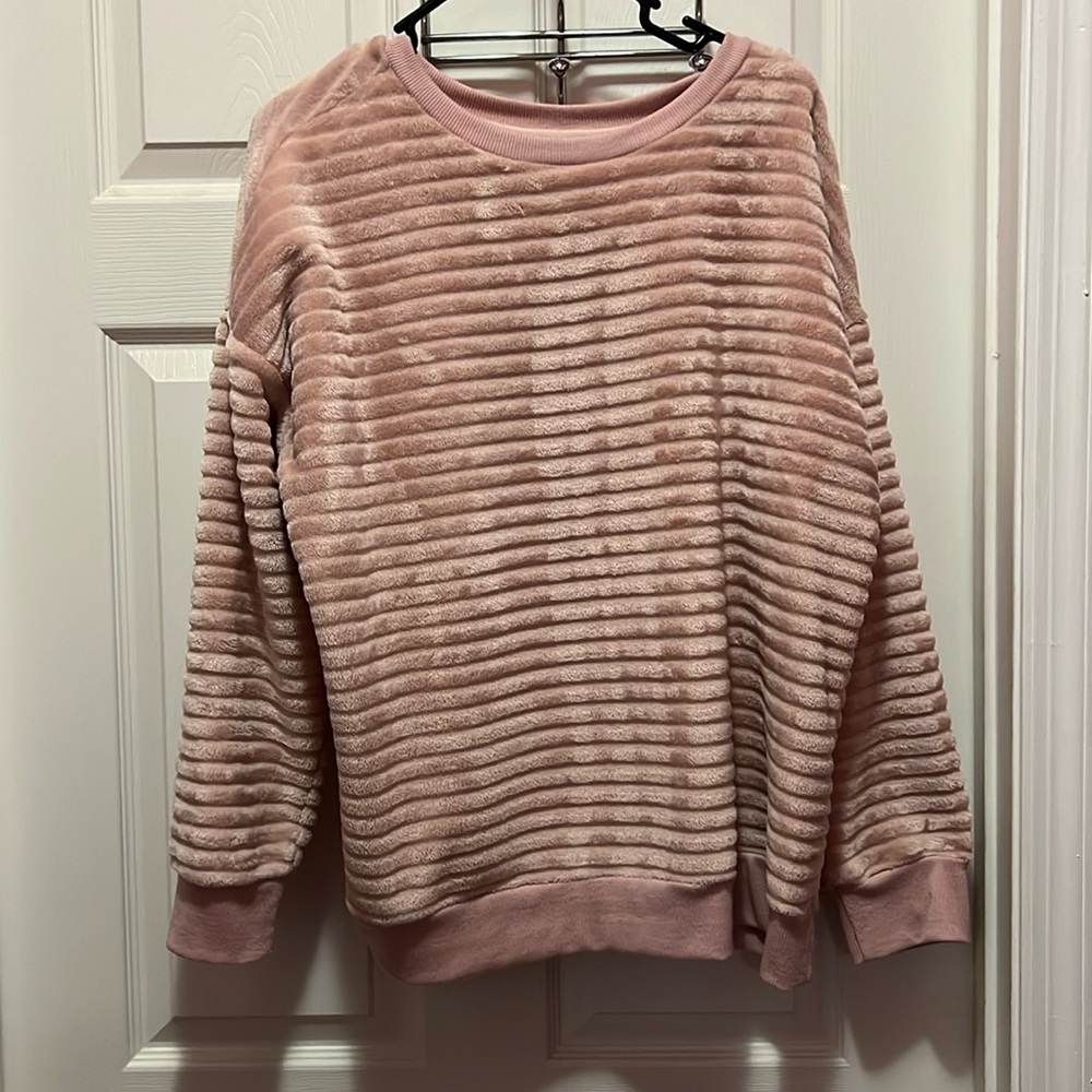 Lined warm top that is light very soft pink
